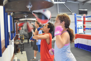 Siarah (8) and Khorey (7) working like pros on the speed bags