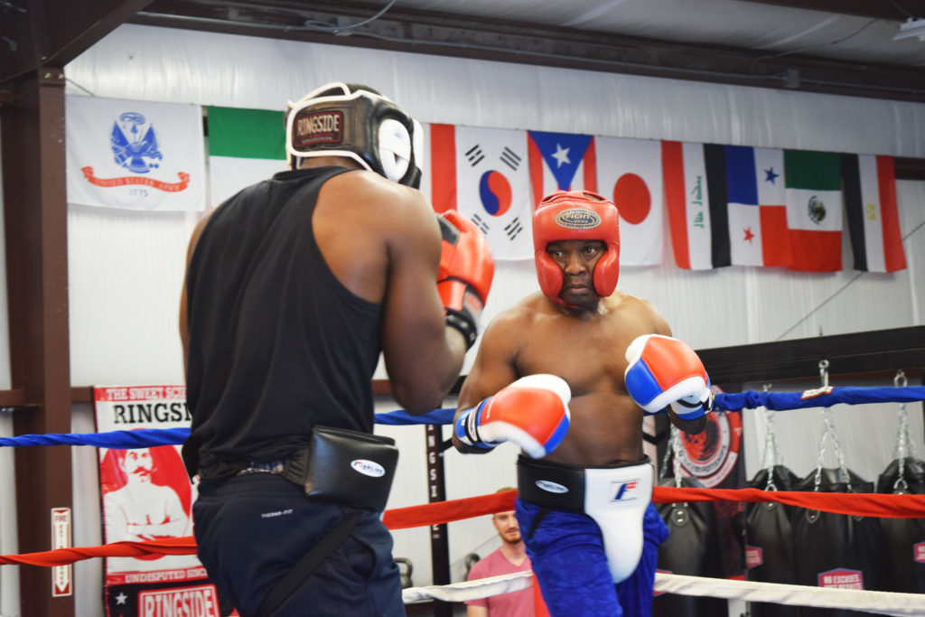 Fulton in the ring with Sterling Gloves hopeful Jeffrey Seabury. This year's tournament is Seabury's first fight and he is "Looking forward to knocking someone on their... "