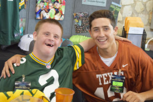 Georgetown spirit leader Jared and baseball leader Ty provided volunteer support at The Locker table.