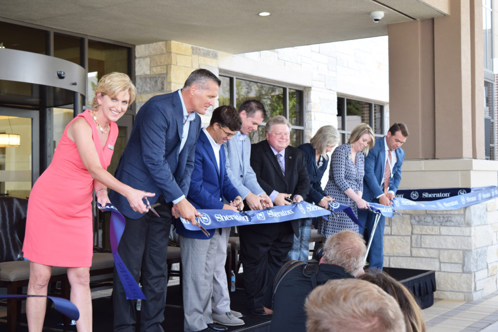 L-R: General Manager Rita Healy, Builder Jeff Novak, Hines Property Andy Heard, North America Sheraton Bob Jenkins, Mayor Dale Ross, Sr VP of Sheraton West Operations Carla Murray, Rachel Arnold for Commissioner Valerie Covey, Jonas Miller Chief of Staff for Congressman John Carter.