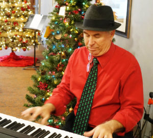 Austin entertainer David White played merry tunes throughout the party.